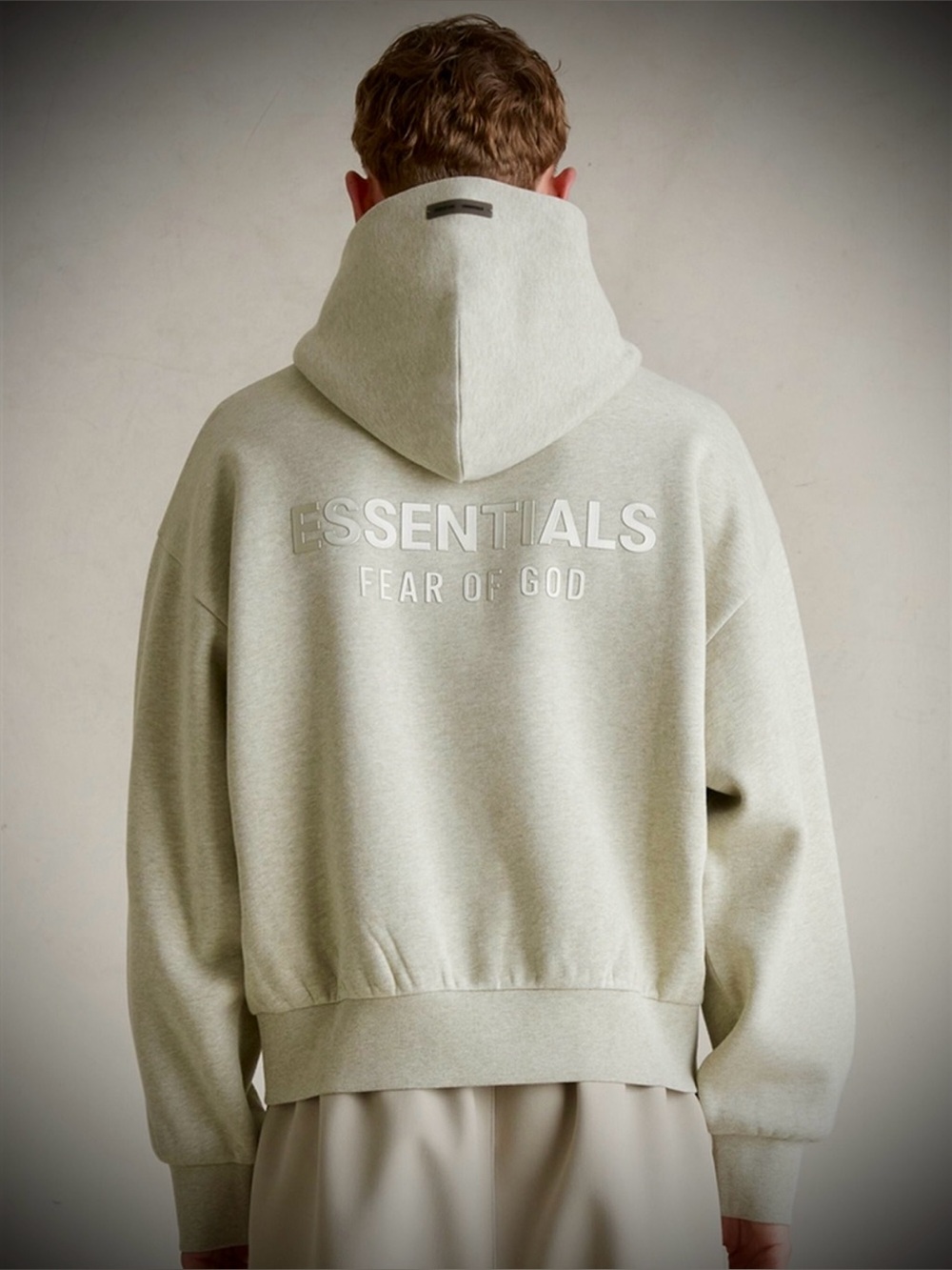 🆕 Fear of God ESSENTIALS Metallic Back Logo Heather Stone Classic Fleece Hoodie